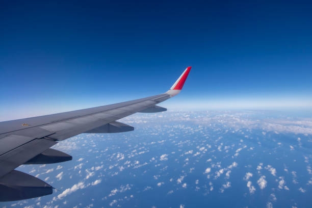istock Aeroplane wing view from window beautiful sky. Traveling concept 1130108993