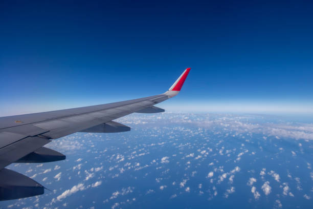 istock Aeroplane wing view from window beautiful sky. Traveling concept 1130108999