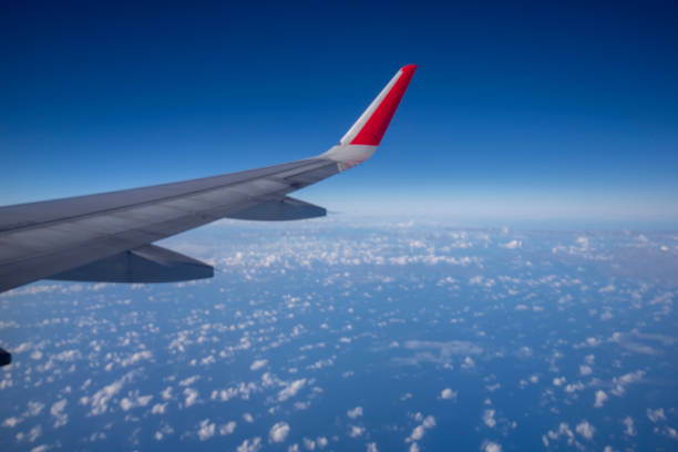 istock Aeroplane wing view from window beautiful sky. Traveling concept 1130109041