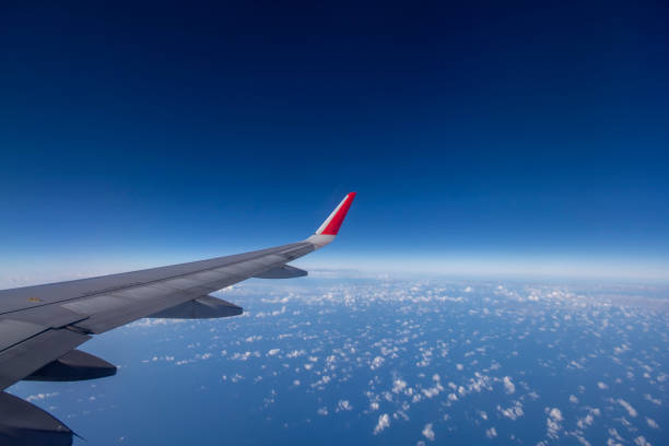 istock Aeroplane wing view from window beautiful sky. Traveling concept 1130109085