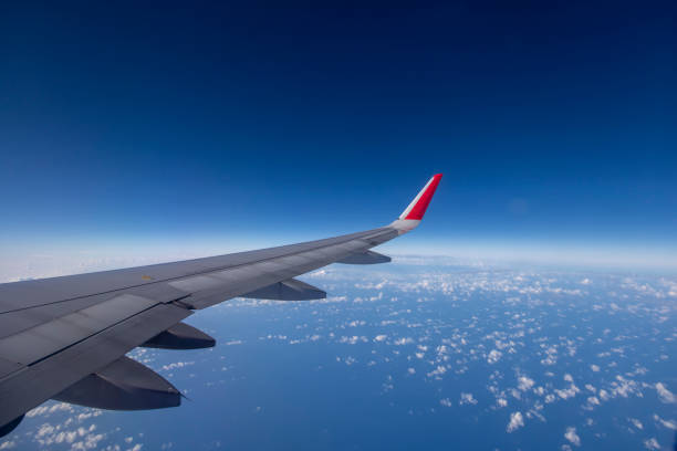istock Aeroplane wing view from window beautiful sky. Traveling concept 1130109087