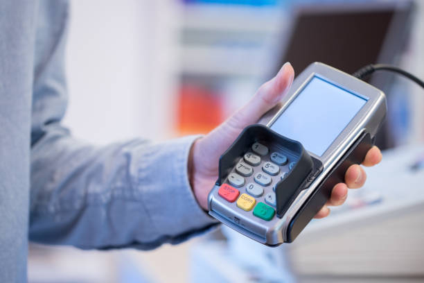 istock Payment terminal in a shop, paying by card 1130109323