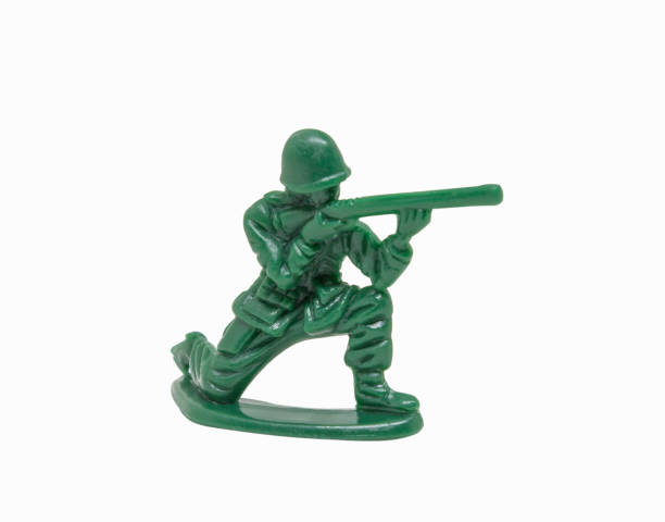 istock miniature toy soldier on white background; close-up 1130110774