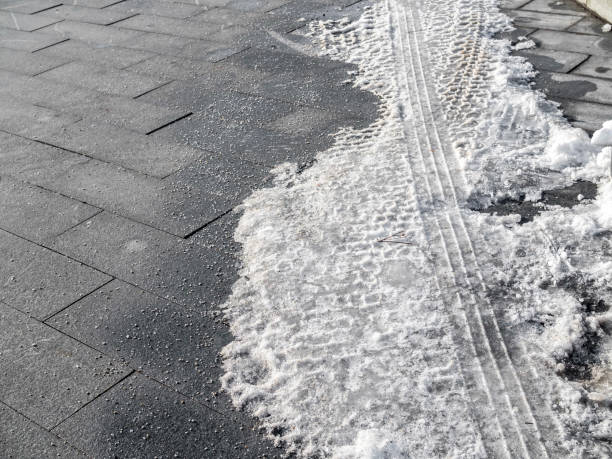 istock Vehicle​ tire prints over​ snow​ residue on​ tiled floor. 1130111830