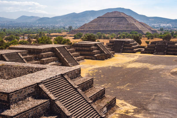 View of the Pyramid of the Sun at the Ancient Aztec City of Teotihuacan, Mexico View of the Pyramid of the Sun and Avenue of the Dead at the ancient Aztec city of Teotihuacan, Mexico. mexico state photos stock pictures, royalty-free photos & images