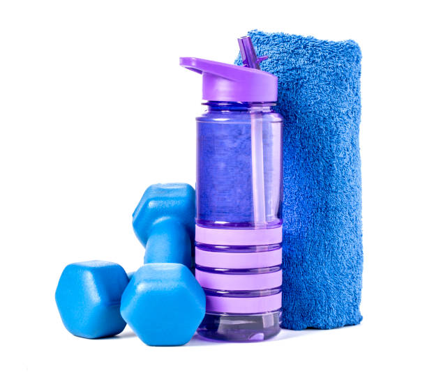 istock fitness dumbbells and water isolated 1130114879