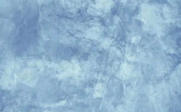 Photo of Grunge Light Blue Painted Stucco Background