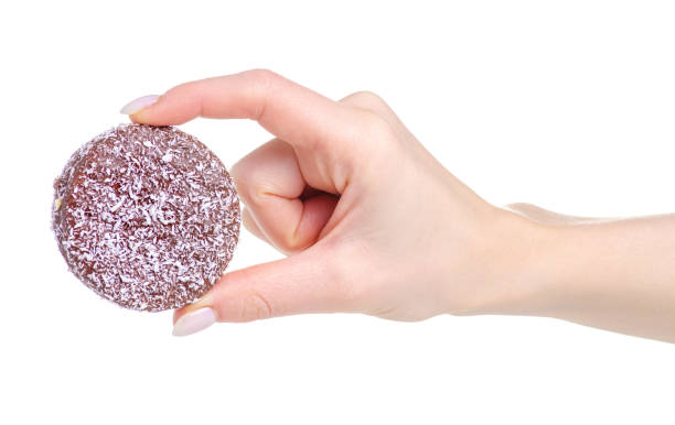 istock cookies with chocolate coconut marshmallow in hand 1130117336
