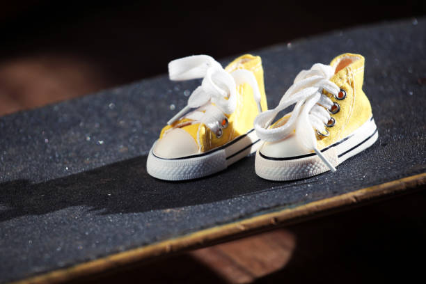 yellow sneakers skateboard background