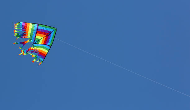 istock big colorful kite flies free in the blue sky 1130120308