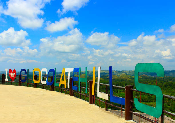 Carmen, Bohol, Philippines - September 30, 2018: Viewpoint on amazing Chocolate Hills during the rainy season. Natural attraction of the Municipality of Carmen on the island of Bohol.