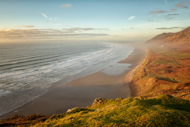 Landscape image of Rhossili Bay, South Wales Landscape image of Rhossili Bay, South Wales at sunset rhossili bay stock pictures, royalty-free photos & images