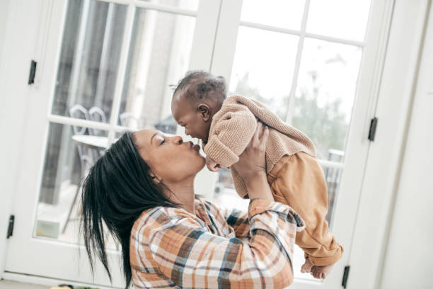 istock Mom and her cute 4 months baby 1130128025
