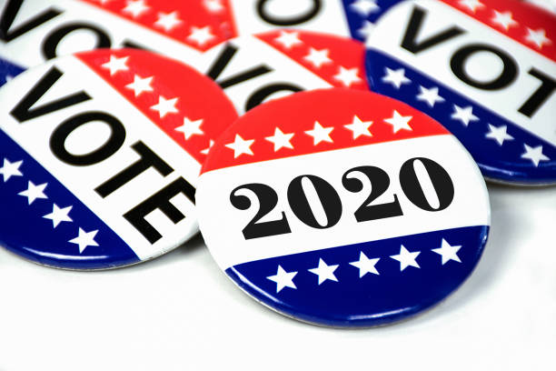 election voting pins for 2020 close up of political voting pins for 2020 election on white democratic party usa photos stock pictures, royalty-free photos & images