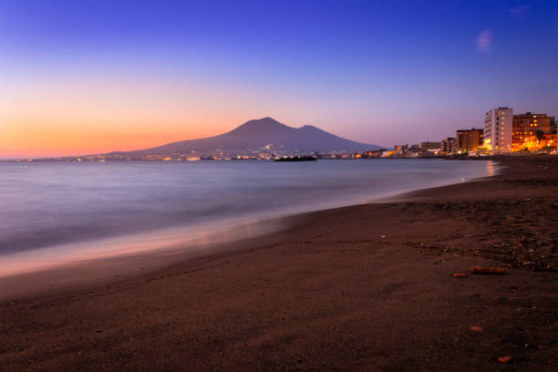 Sunset from a beach in Castellammare di Stabia and Mount Vesuvius and the Bay of Naples, Naples (Napoli), Italy, Europe stock photo