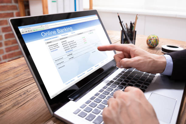 istock Businessperson Pointing Finger On Laptop Screen 1130134910