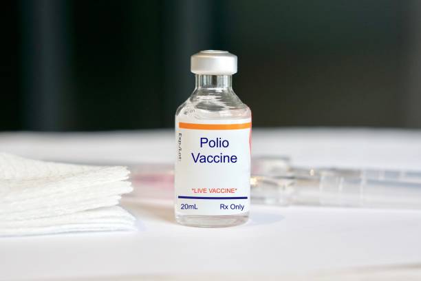 Polio Vaccine in a glass vial Concept of a vaccine/immunization, fake label polio vaccine stock pictures, royalty-free photos & images