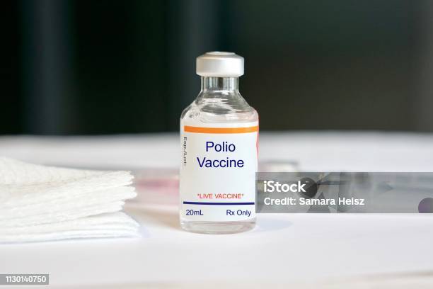 Polio Vaccine In A Glass Vial Stock Photo - Download Image Now - Polio Vaccine, Polio, Polio Virus