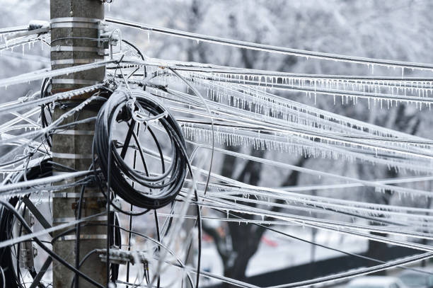 istock Electricity cables covered in ice after frozen rain phenomenon 1130140853