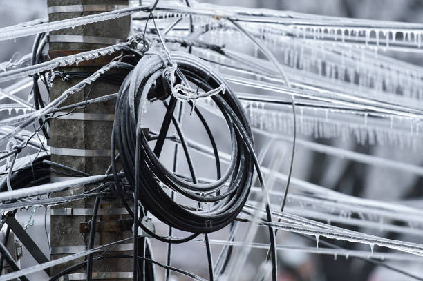 istock Electricity cables covered in ice after frozen rain phenomenon 1130140952