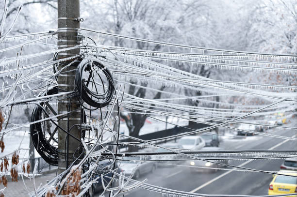 istock Electricity cables covered in ice after frozen rain phenomenon 1130140954