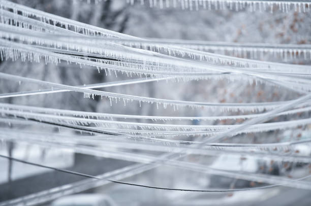 istock Electricity cables covered in ice after frozen rain phenomenon 1130141044