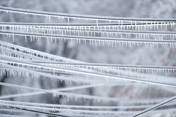 istock Electricity cables covered in ice after frozen rain phenomenon 1130141051