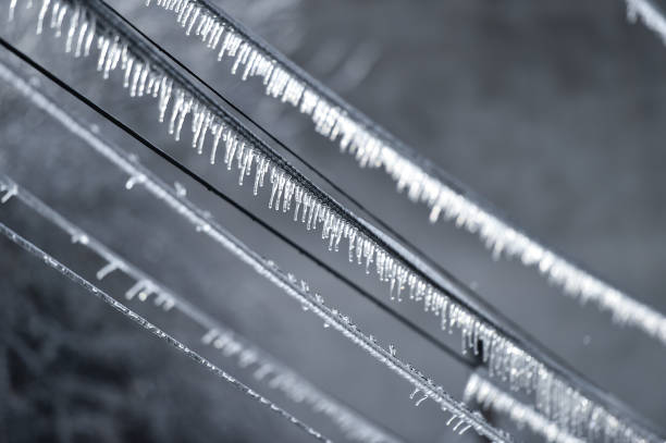 istock Electricity cables covered in ice after frozen rain phenomenon 1130141605