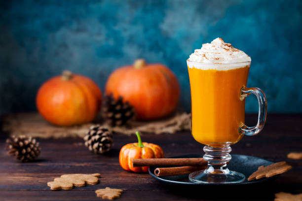 istock Pumpkin spice latte, smoothie with whipped cream. Wooden background. Copy space. 1130141774