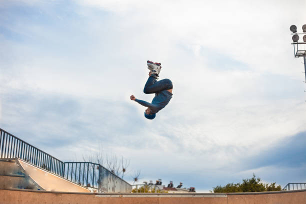 istock Young man jump from ramp with roller skate 1130144909