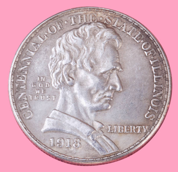 istock half dollar coin isolated on pink background 1130146990