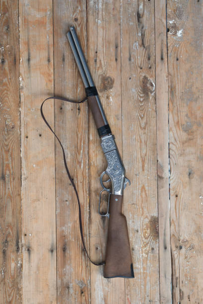 istock old rifle on a wooden wall 1130147293
