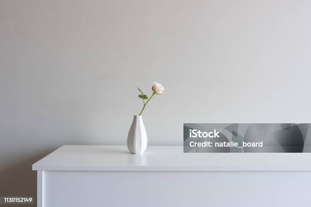 Single Pale Pink Rose On White Sideboard Stock Photo - Download Image Now - Vase, Rose - Flower, Pink Color