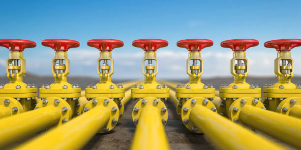 yellow gas pipe line valves. oil and gas extraction, production  and transportation industrial background. - water valve oil gas imagens e fotografias de stock