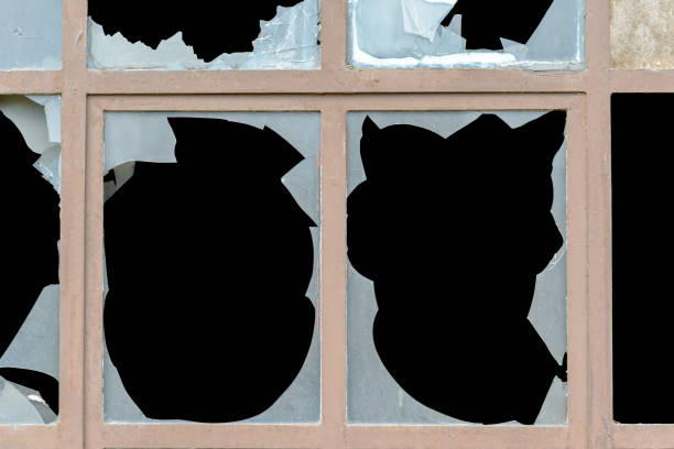 istock Old window with broken panes of glass 1130164087