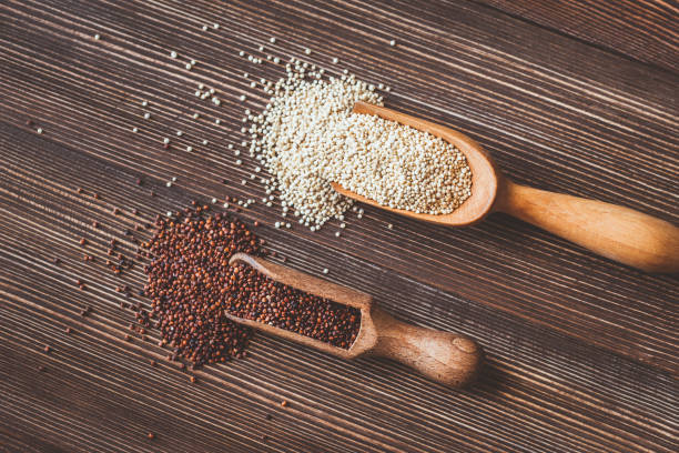 istock Scoops of white and red quinoa 1130166491