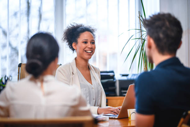 istock Couple meeting financial advisor in the office 1130168901