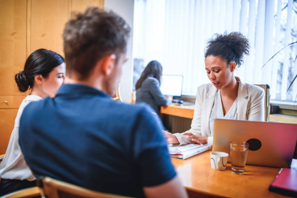 istock Couple meeting financial advisor in the office 1130168908
