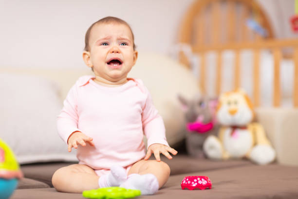 Baby girl crying, screaming and howling