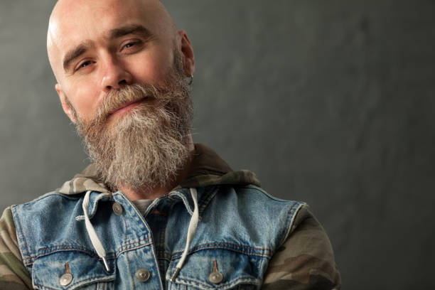 Studio Portrait Of A 35 Year Old Bearded Man Stock Photo - Download Image  Now - Men, Biker, Macho - iStock