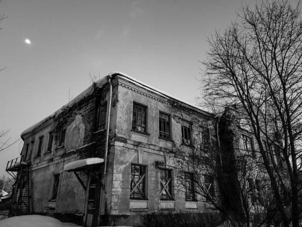istock The Old abandoned house. Abandoned house at night. 1130174024
