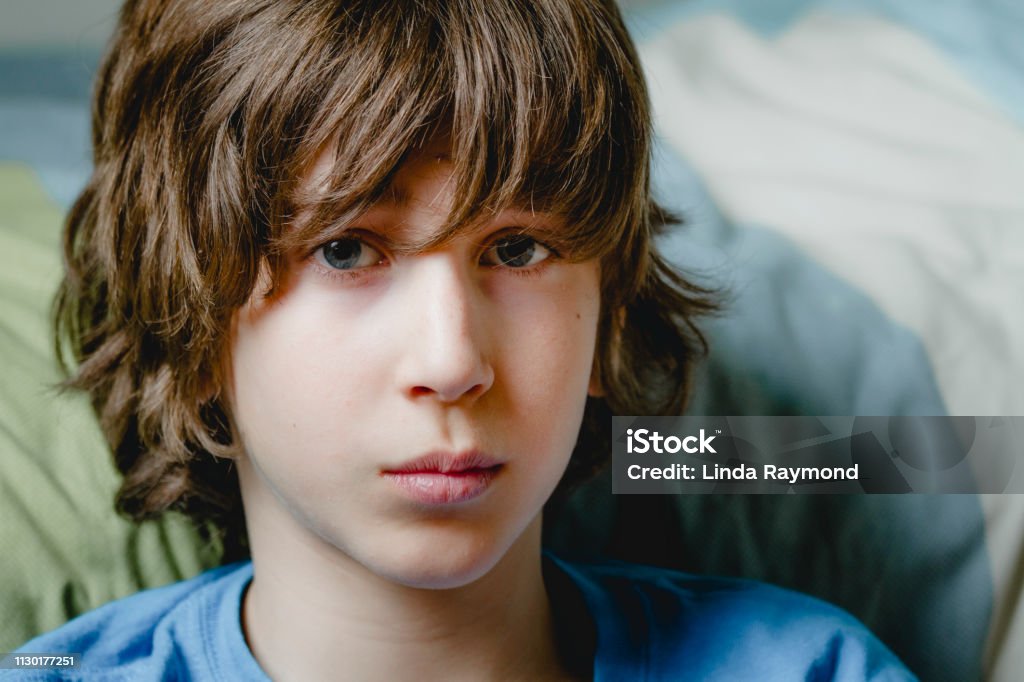 Portrait of a teenage boy one teenage boy only, 12-13 years, teenager, portrait Boys Stock Photo