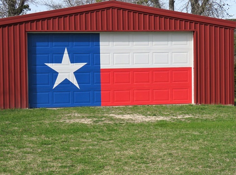 Texas flag painted on garage door