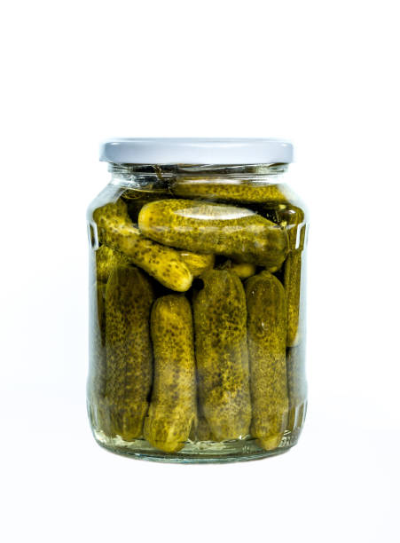 istock The glass jar with cucumbers 1130184720