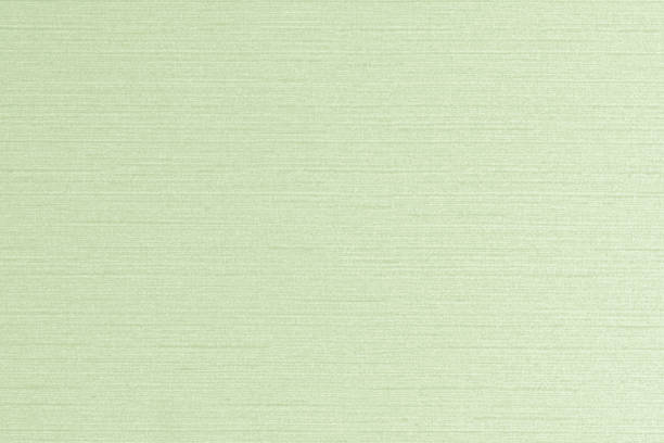 istock Cotton linen woven fabric texture background in light pale lime green color 1130187683