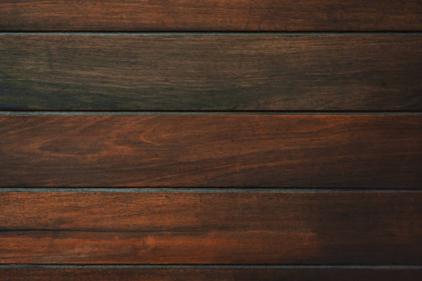 istock Dark brown wood texture with natural striped pattern background 1130188023
