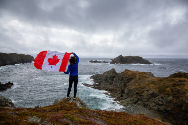 istock Girl with Canadian Flag 1130188758