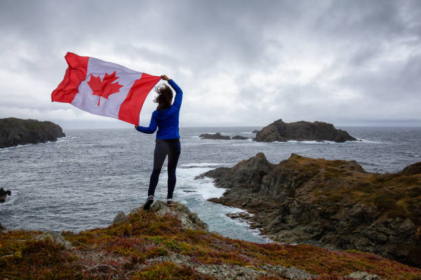 istock Girl with Canadian Flag 1130189580