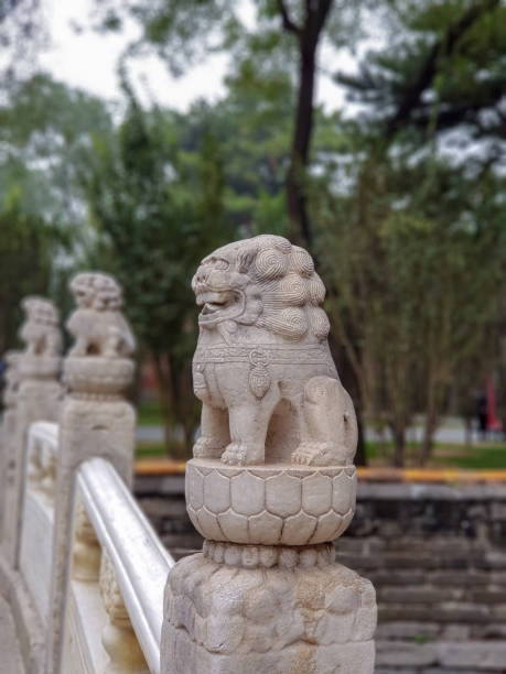 istock Stone Guardian Lion Statue in bridge, Forbidden City 1130195421