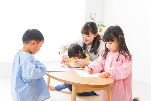 istock Children and teacher at Kindergarten 1130195458